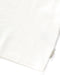 Close up of 'Outerknown' tag on seem of white short-sleeved t-shirt